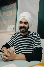 Tech-savvy man using a laptop at a modern workspace